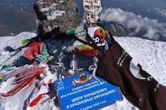 12A Flags, Plaques And Mementos On The Mount Elbrus West Main Peak Summit 5642m.jpg